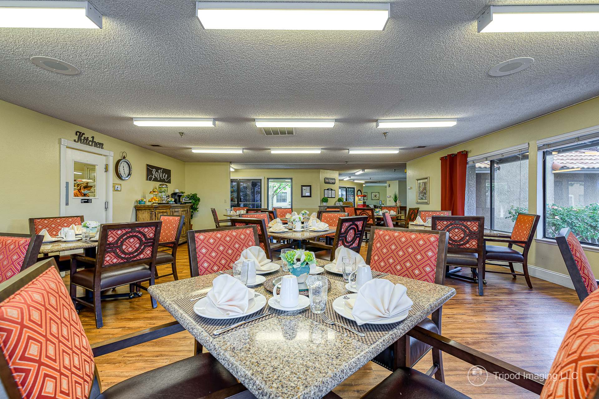 image of a bedroom showing a couch, table, and balcony
